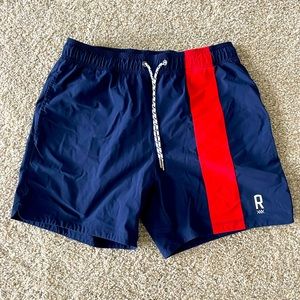 Rhône men’s swim trunks. Blue with red stripe size Medium.